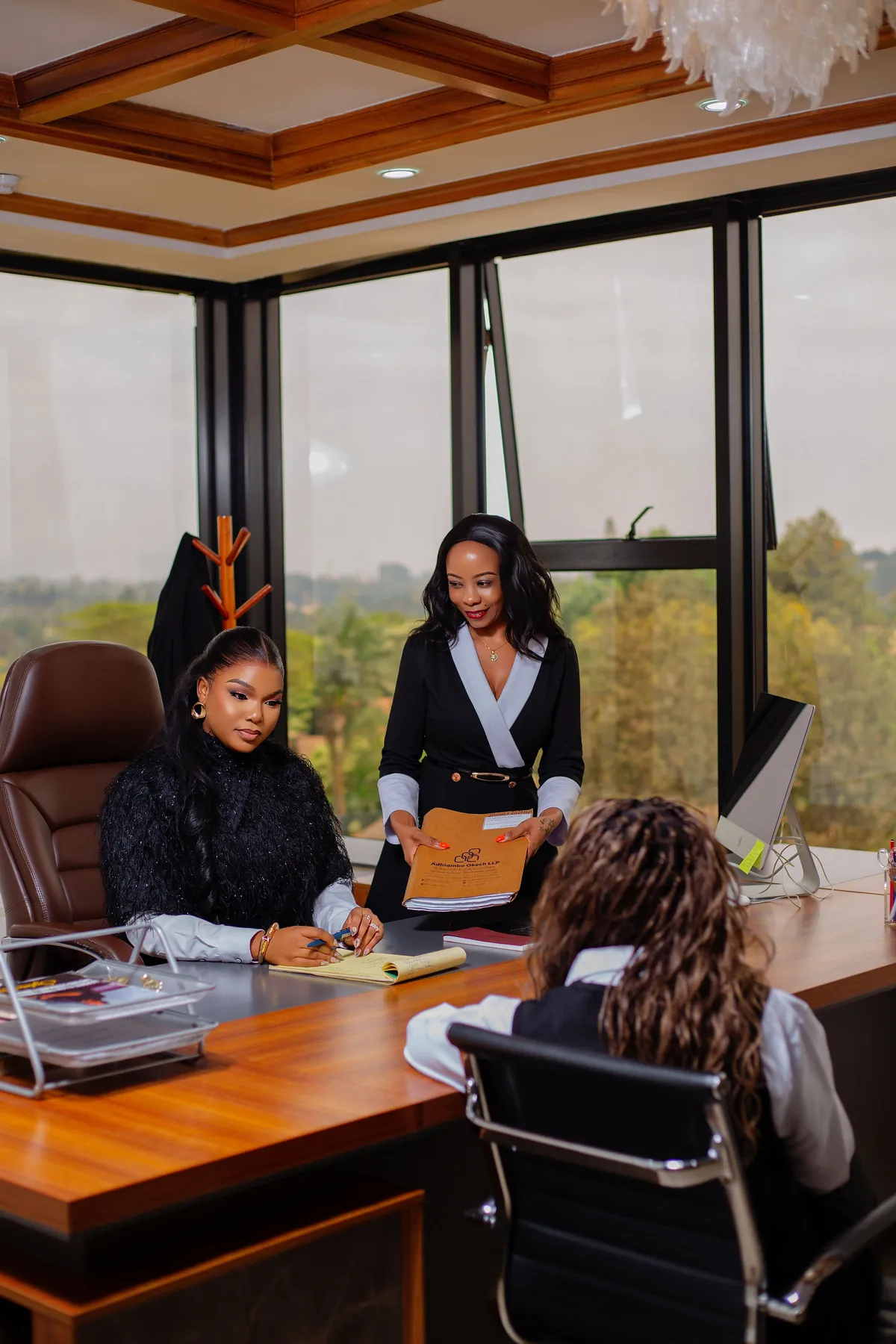 Advocates of the firm at a client meeting in the Nairobi office